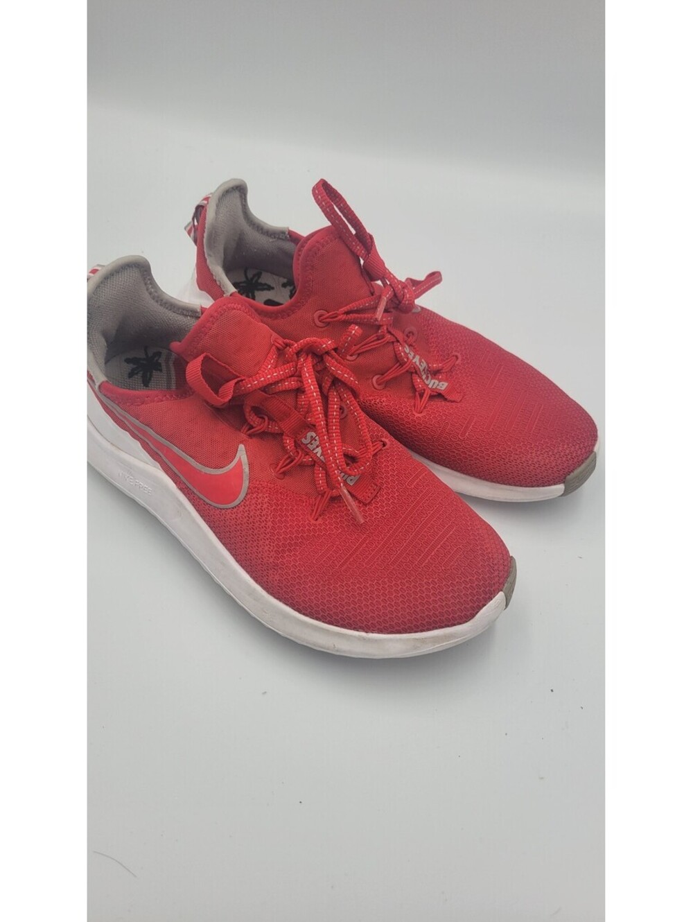 Nike red running shoes